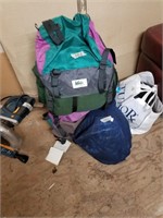 Lot with REI backpack and sleeping bag, and 2 moto