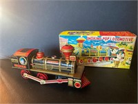 Vintage Smoking Pop Locomotive Train Toy