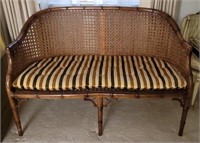 Vintage wicker style love seat with cushion