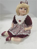 9" sitting doll