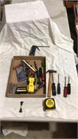 Screw driver, tape measure, drill bits, leveler,