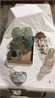 Hanging shell decoration, glass jars, glass bowl