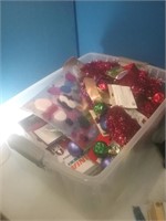 Rubber tote of holiday decorations and ornaments