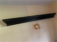 Dark wood wall shelf w/ plate rail