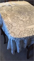 Two lace tablecloths