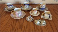 Assorted teapots & saucers, miniatures