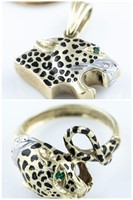 2 14k gold pieces of leopard jewelry.