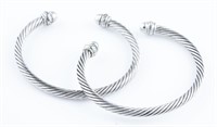 2 David Yurman silver cable cuff bracelets.