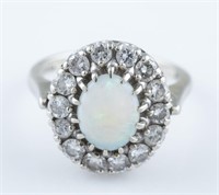 14k Opal and diamond ring.