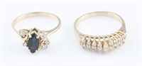 2 Yellow gold diamond rings.
