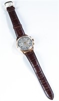 Maxor 18k wristwatch.