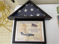 American flag flown over Iraq - nice display case-