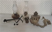 Kerosene lamps, antique cast iron wall bracket,