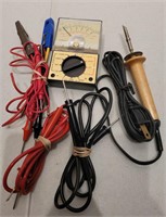 Assorted electrical meters and soldering iron