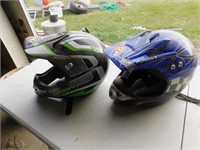 Pair of moto cross helmets