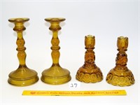 (2) pairs of amber/yellow glass candlesticks; (1)