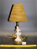 Small vintage ceramic lamp w/gentleman on metal