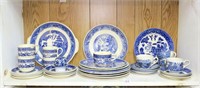 Shelf lot of vintage blue/white plates, cups,