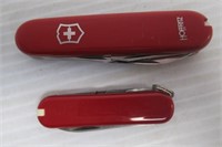 (2) Swiss Army knives.