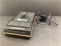VHS cassette tape rewinder.