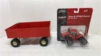 Case IH STX450 tractor and ERTL tractor tipping