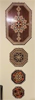 4 decorative inlaid trays currently used as wall