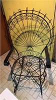 Fancy black metal rocking chair, just needs a
