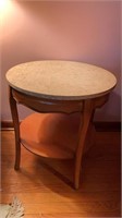 Nice round 2 level side table with a polished