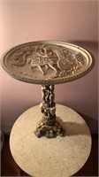 Molded sculpture side table with dragon feet,