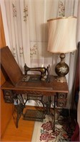Antique Singer sewing machine on the original oak