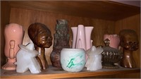 Shelf lot with three pink vintage flower vases,