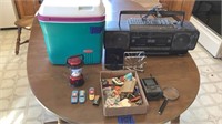 Cooler, radio/cassette player , magnets,