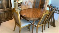 Table with 2 leaves and 5 chairs -65 1/2” no