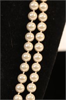 KNOTTED WHITE PEARL STRAND NECKLACE