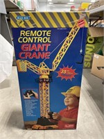 GIANT CRANE TOY, IN OPEN BOX, UNKNOWN IF COMPLETE