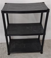 (O) Black Plastic Shelf. 27" L. × 15" W. × 36.25"