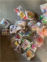 Several happy meal toys unopened (tote Not
