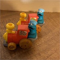 Sesame Street car figures and Ernie in bumper c