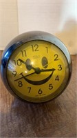 Vintage smiley face clock and vintage cast toy