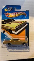 10 Hot Wheels in unopened boxes