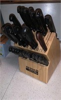 Large knife block with 28 kitchen knives, all