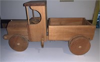 Large wooden toy truck, with a lift up gate,