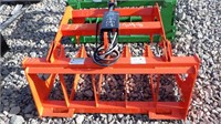 Unused 48" orange root grapple for Skid/Tractor