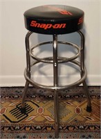 A retro style Snap On swivel stool