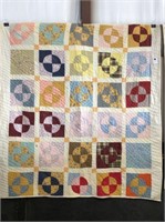 Beautiful Hand-Sewn Quilt with white backing