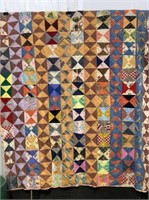 Hand-Made Quilt with Modified Bow Tie Pattern