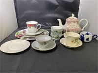 Assorted plates, cups, saucers, tea pot