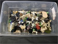 Tub of old buttons
