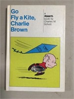 A  peanuts  book by Charles SCHULZ  Charlie brown