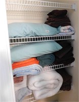 closet of assorted linens and towels